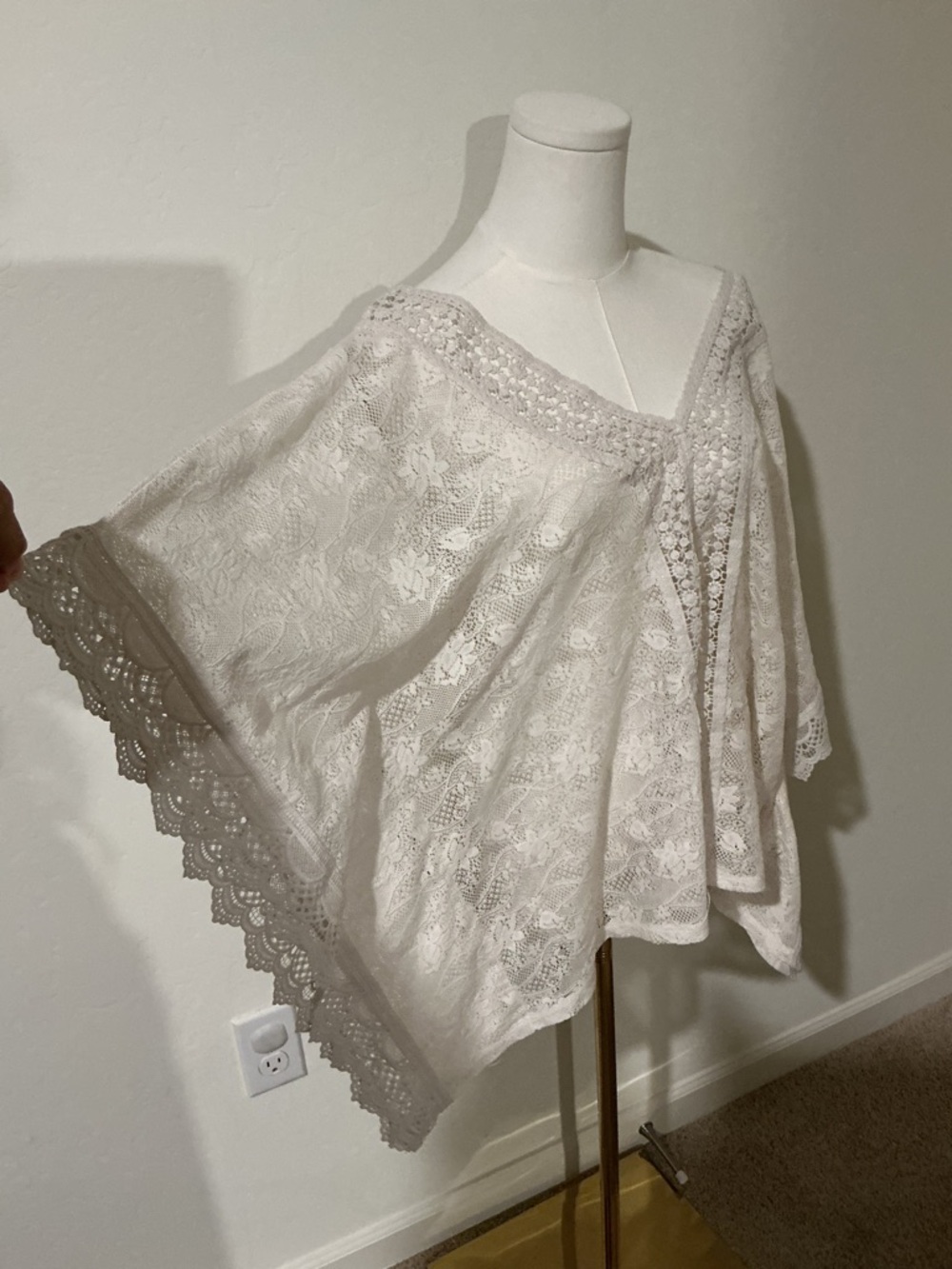 Candie’s white Cream sheer crotchet poncho